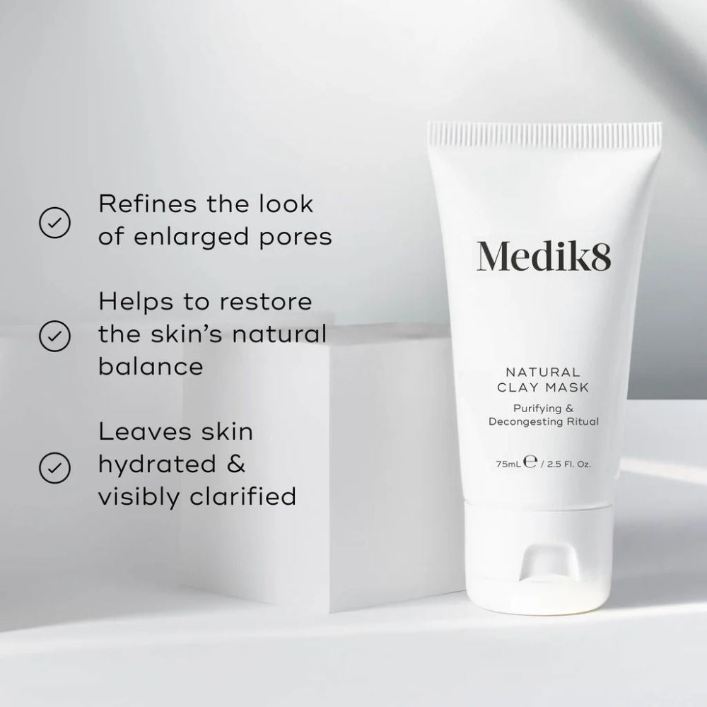 Medik8 natural clay mask tube with product benefits text on a light gray background