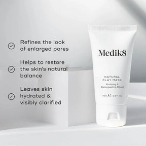 Medik8 natural clay mask tube with product benefits text on a light gray background